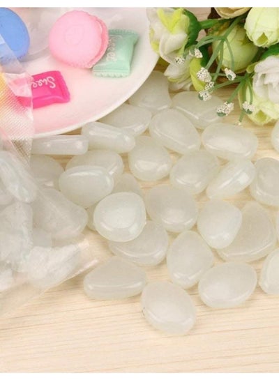 Buy 100 Glow in Dark Pebbles for Home and Garden Decor | Luminous Decoration Stones for Aquarium and Pathways in UAE