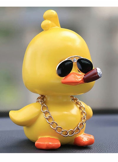 اشتري Cute Yellow Duck Toy Car Ornaments Cool Duck Car Dashboard Decorations Shaking Head Doll في الامارات