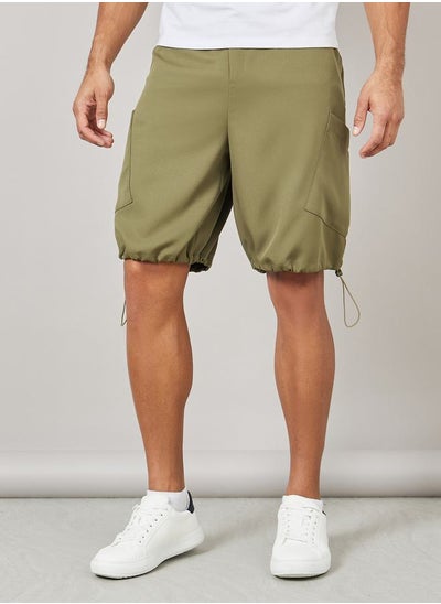 Buy Oversized Parachute Woven Drawcord Hem Shorts with Pocket Detail in Saudi Arabia