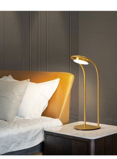 Buy Simple gold table lamp, built-in LED lighting, suitable for bedside tables, living room and small offices in Saudi Arabia