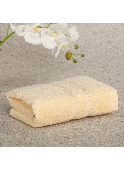 اشتري Ritzy Cotton Hand Towel, Butter - 50X80 Cms في الامارات