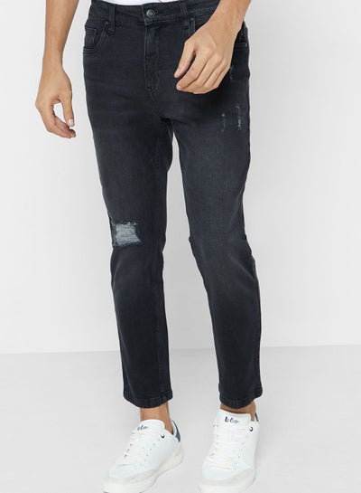 Buy Tapered Cropped Fit Rip Detail Jean in UAE