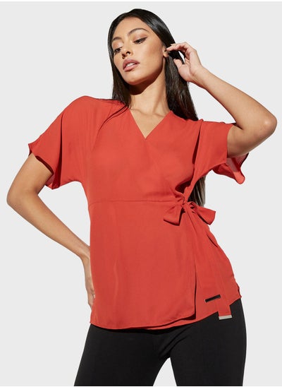 Buy Surplice Neck Wrap Top in Saudi Arabia