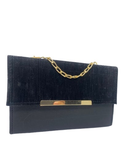 Buy Luxurious women's leather bag, black color with a golden metal handle in Egypt