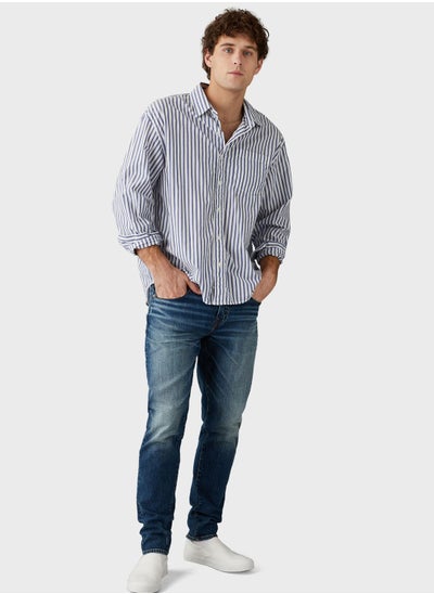 Buy Mid Wash Slim Fit Jeans in Saudi Arabia