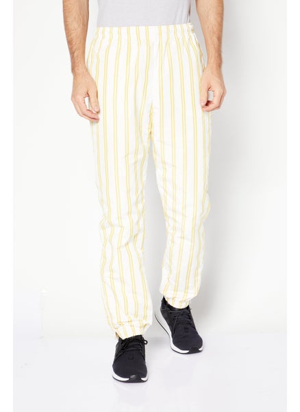 Buy Men Regular Fit Stripe Track Pant, White/Yelllow in Saudi Arabia