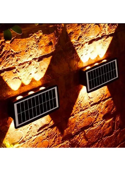 اشتري 4 Pack Solar Light Outdoor Up Down 6 Led Solar Wall Solar 2-Color Warm and White Light Accent Waterproof Decorative Lighting for House Fence Outside Step Stairs في الامارات
