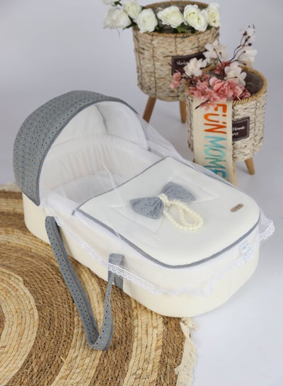 Buy Portable baby bed with thick padded seat, high-quality materials, white color, with multi-colored stars design, 67×30×16 cm in Saudi Arabia