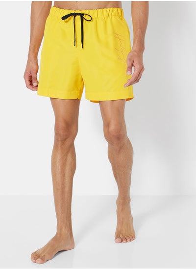 اشتري Mid-Length Logo Swim Shorts في الامارات