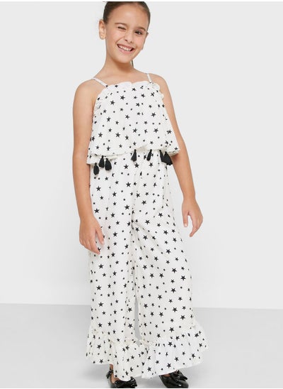 Buy Natilene Girls Printed Shoulder Strap Basic Jumpsuit With Tassel Details in UAE