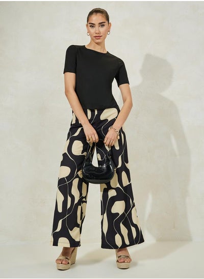 Buy Solid Knit Top & Printed Flared Pants Co-Ords in Saudi Arabia