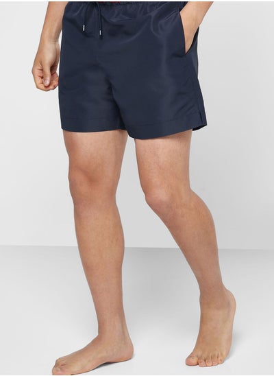 Buy Logo Band Swim Shorts in UAE