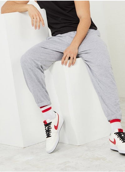 Buy Solid Oversized Fit Elastic Cuff Jogger in Saudi Arabia