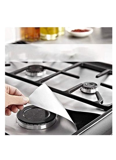 اشتري Set of aluminum stove foil and stove protector, square size 25 x 25 cm (30 pieces) في مصر