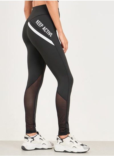 اشتري Calf Mesh Insert Side Hip Text Detail Full Length Leggings في السعودية