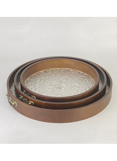 Buy A set of luxurious round serving trays with a modern design, 3 pieces, wooden / transparent in Saudi Arabia