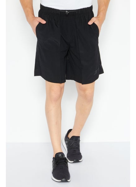 Buy Men Sportswear Fit Brand Logo Training Short, Black in UAE