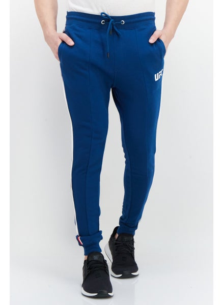 Buy Men Sportswear Fit Brand Logo Training Jogger Pant, Teal Blue in Saudi Arabia