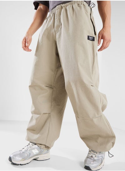 Buy Woven Retro Washed Parachute Pants in UAE