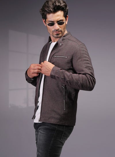 Buy Stylish, slim-fit jacket with textured design, stand collar, and modern zip details. in Egypt