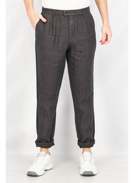 Buy Men Carrot Fit Textured Dress Pants, Dark Grey in Saudi Arabia