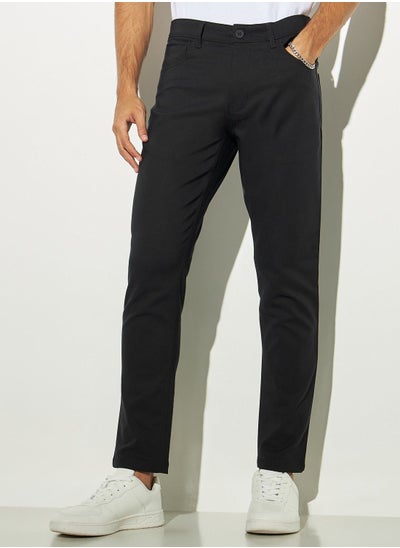 Buy Iconic Solid Regular Fit Trousers with Pockets in Saudi Arabia