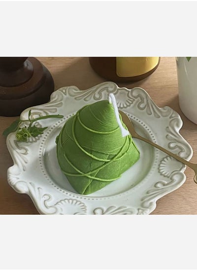 Buy Green Textured Triangle Shaped Candle in Saudi Arabia