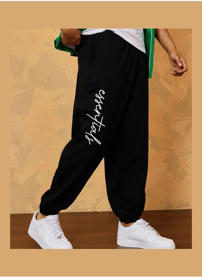 Buy Slogan Print Oversized Jogger with Slip Pocket in Saudi Arabia