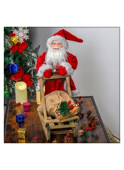 Buy Christmas Santa Claus holding Wooden Sleigh Figurine in UAE