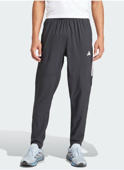 Buy 3 Stripes Own The Run Sweatpants in Saudi Arabia