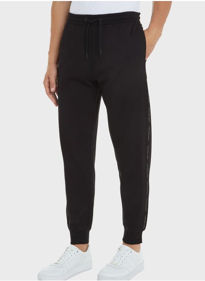 Buy Logo Repeat Sweatpants in Saudi Arabia