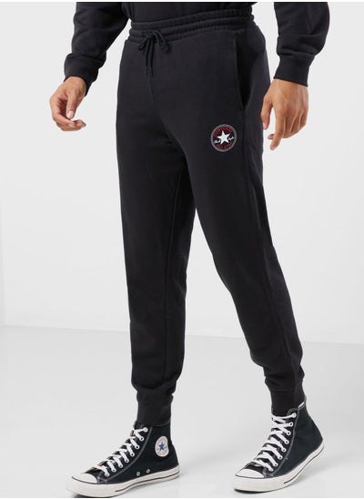 Buy Standard Fit Center Front Large Chuck Patch Sweatpants in UAE