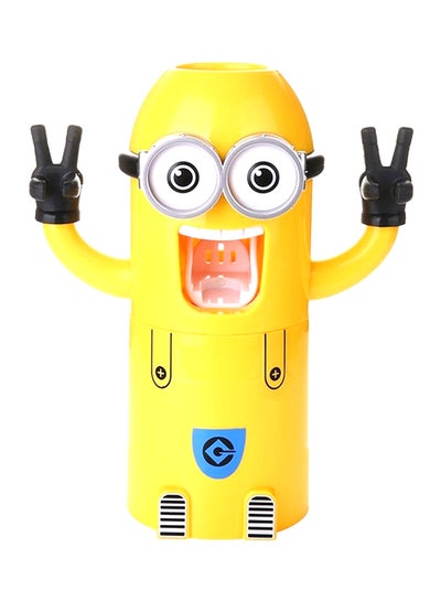 Buy Minions Design Toothbrush Holder With Automatic Toothpaste Dispenser And Brush Cup Yellow 19x8x6.2centimeter in UAE