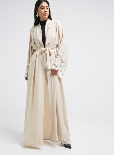 Buy Pearl Detailed Abaya Cream in UAE