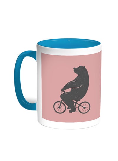 Buy Bear Driving A Bicycle Printed Coffee Mug Turquoise/White in Egypt