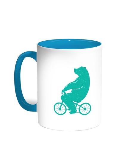 Buy Bear Driving A Bicycle Printed Coffee Mug Turquoise/White in Egypt