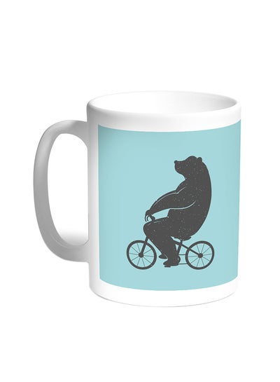 Buy Bear Driving A Bicycle Printed Coffee Mug White in Egypt