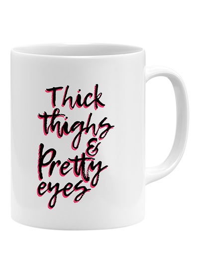 اشتري قدح قهوة يحمل عبارة "Thick Thighs And Pretty Eyes" أبيض 11x14 سنتيمتر في الامارات