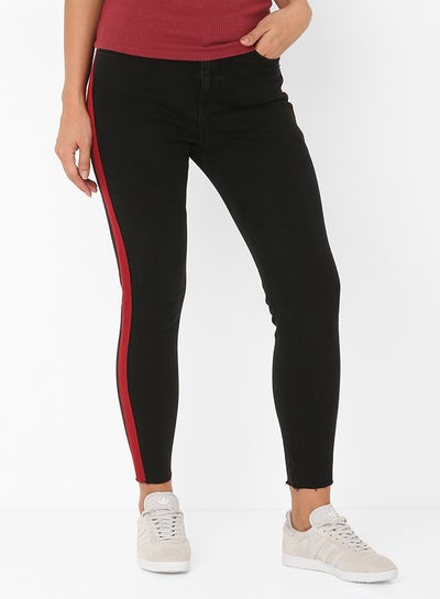 Buy Side Striped Skinny Jeans Black/Red in Saudi Arabia