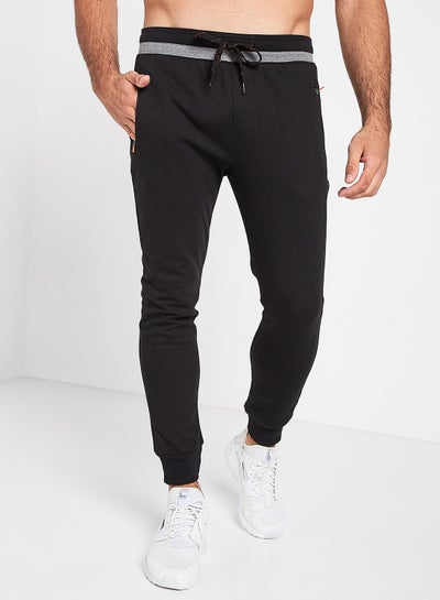 Buy Cotton Slim Fit Sweatpants Black in UAE