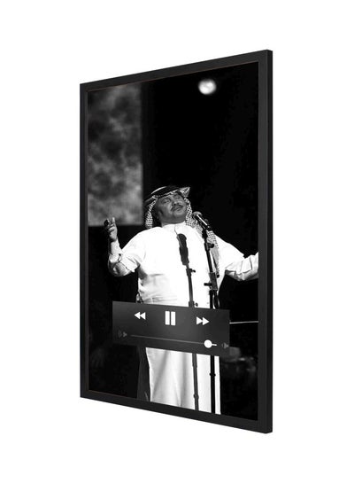 Buy Mohammed Abdo Singing Arabic Framed Wall Painting Black/White 53x73centimeter in Saudi Arabia