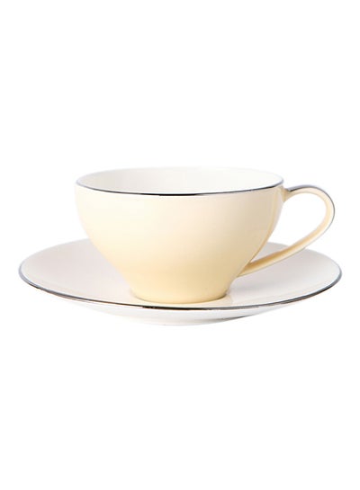 Buy Thin Ceramic Coffee Cup And Saucer Set Yellow 14.5x14.5x2centimeter in UAE