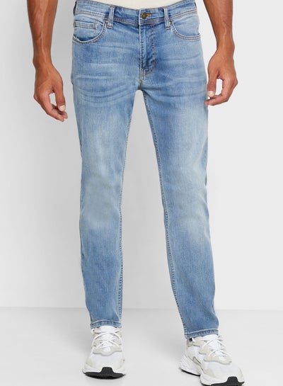 Buy Mid Wash Slim Fit Jeans Blue in UAE