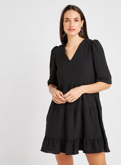 Buy Solid Pattern Ruffled Hem Mini Dress Black in Saudi Arabia