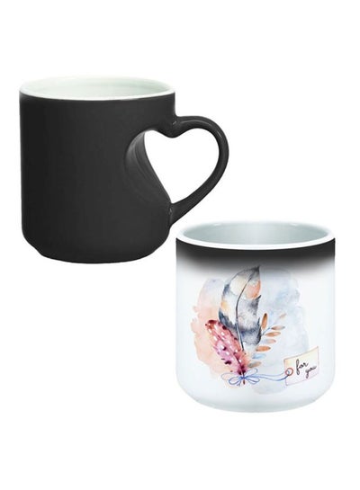 Buy Feather Printed Ceramic Magic Coffee Mug White/Pink in Egypt