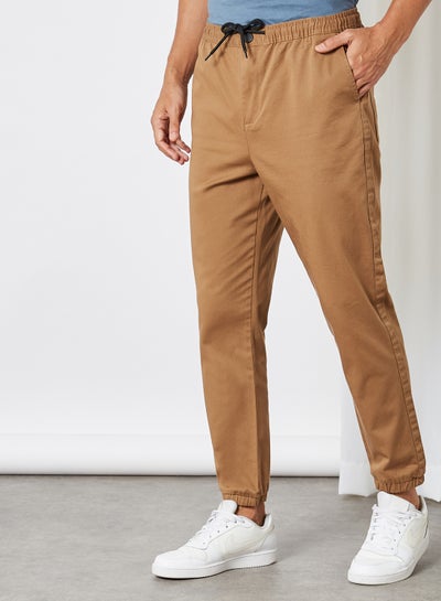 Buy Tapered Joggers Beige in UAE