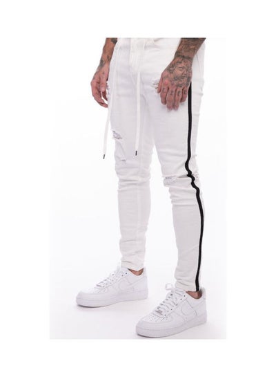 Buy Solid Broken Hole Jeans White in UAE