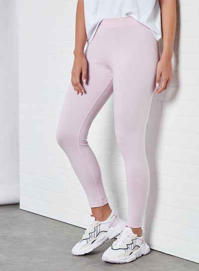 Buy Elastic Waist High-Rise Skinny Fit Plain Leggings Purple in Saudi Arabia