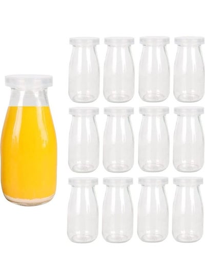 Buy 12-Piece Glass Bottle With Lid Clear in Saudi Arabia