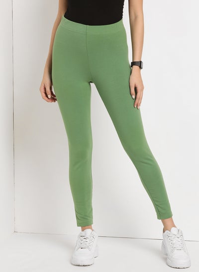Buy Elastic Waist High-Rise Skinny Fit Plain Leggings Green in UAE